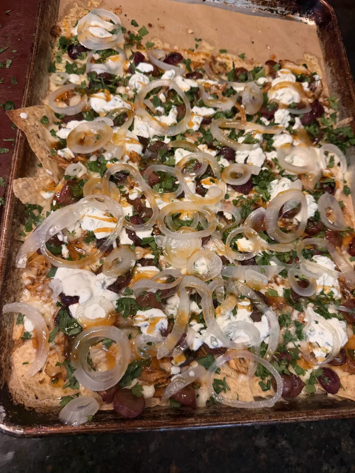 Spicy Chicken & Blistered Grapes nachos from our kitchen