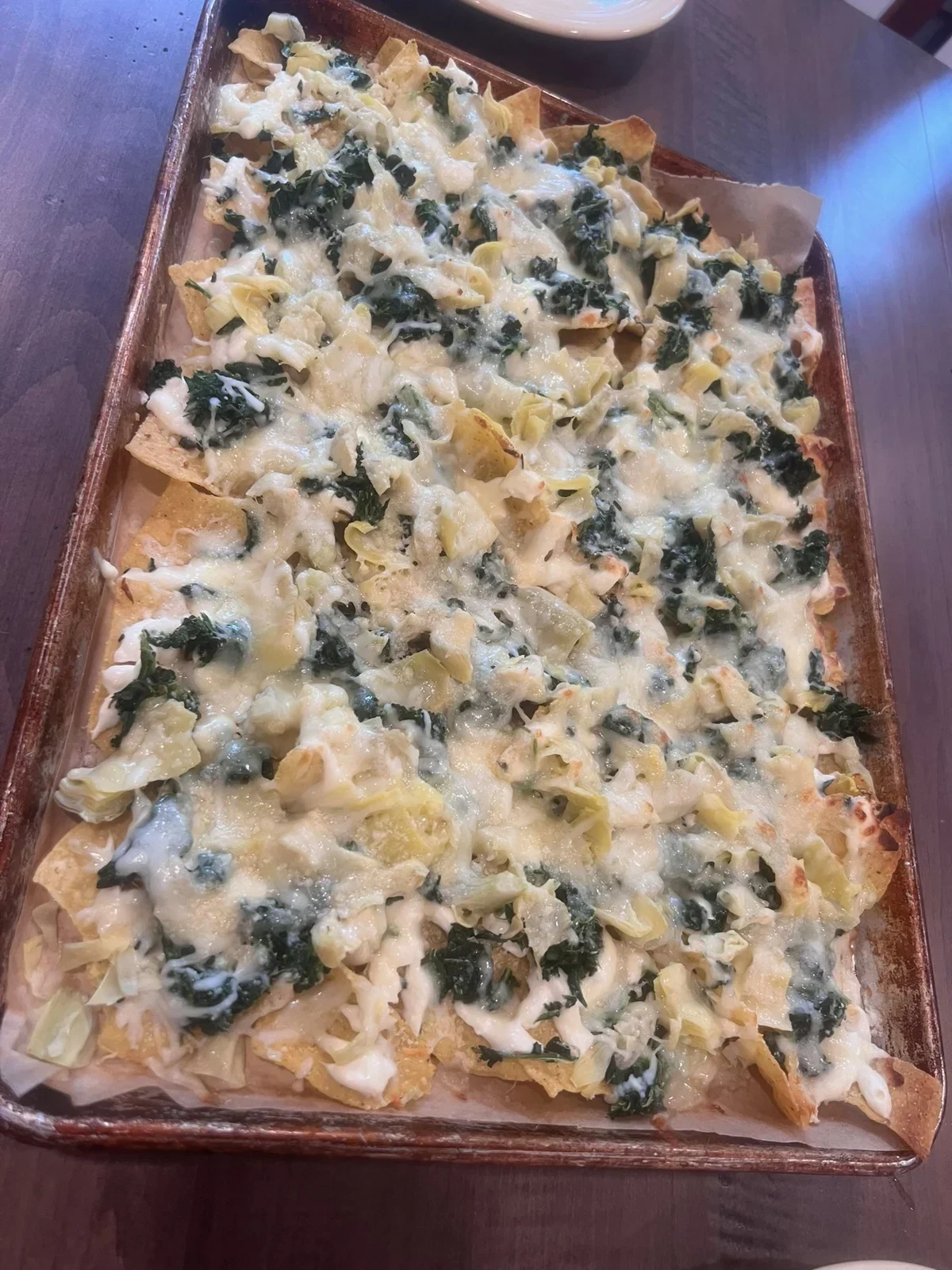 Spinach Artichoke Dip nachos from our kitchen