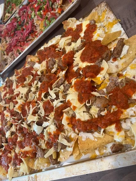 Citrus Carnitas & Celebration Trays nachos from our kitchen